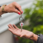 Photo of person being handed keys